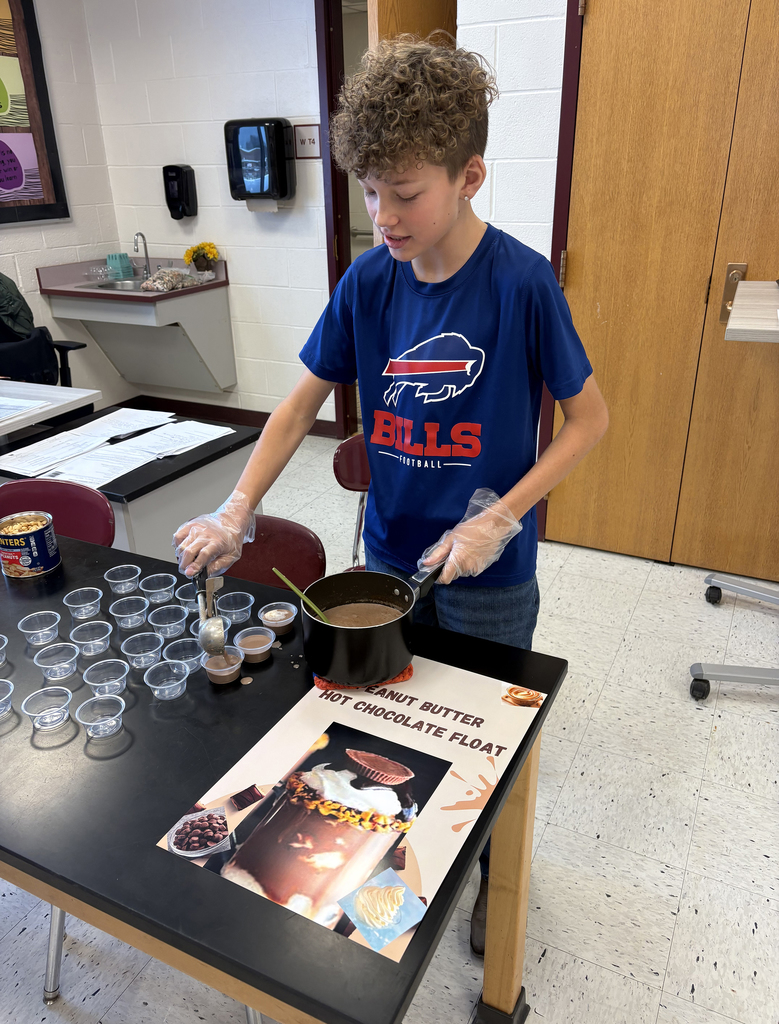 Students showing their hot chocolate project