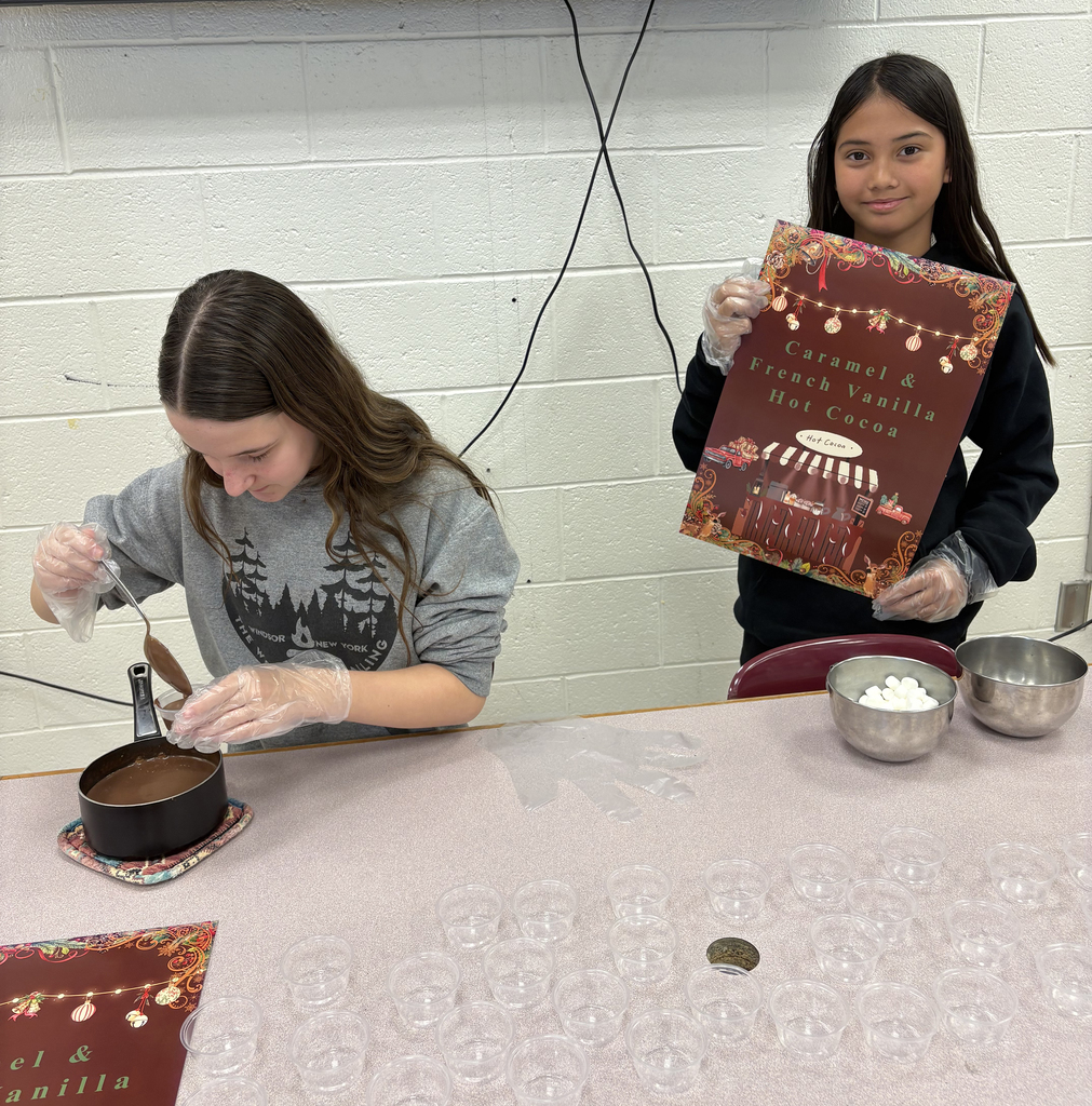 Students showing their hot chocolate project