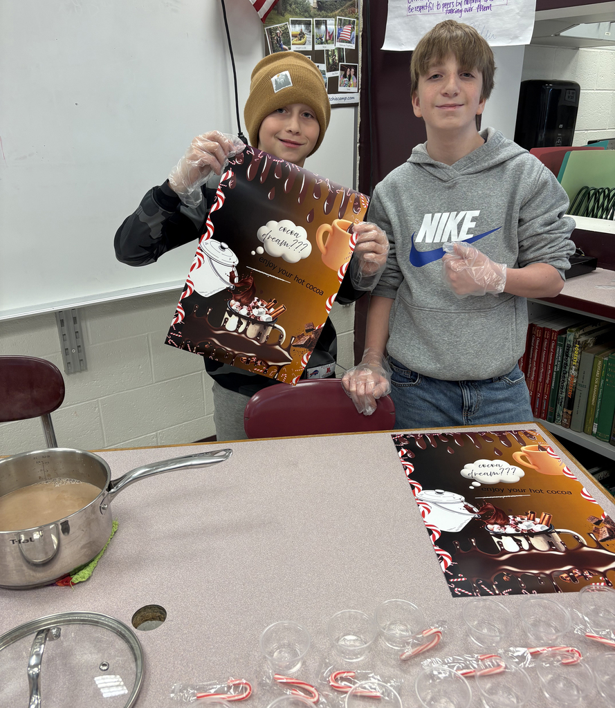 Students showing their hot chocolate project
