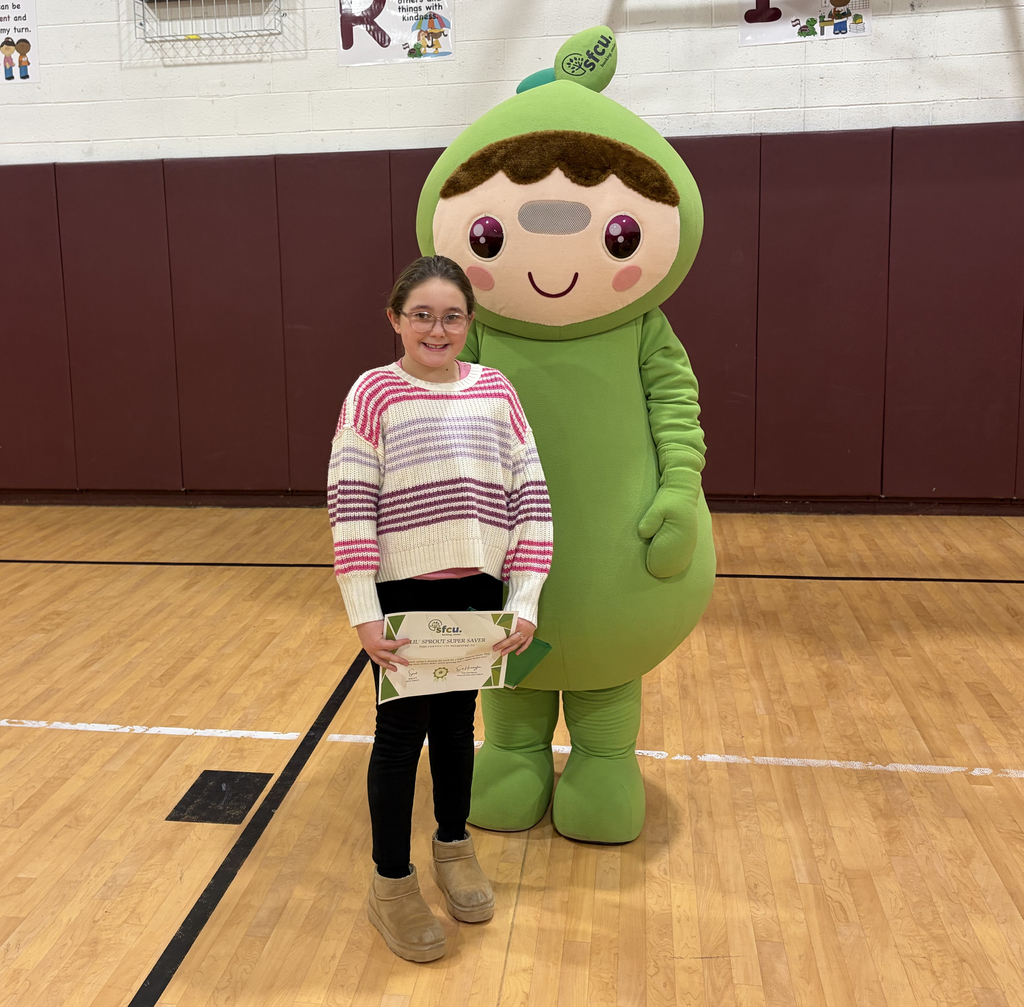 First student with sprout and certificate