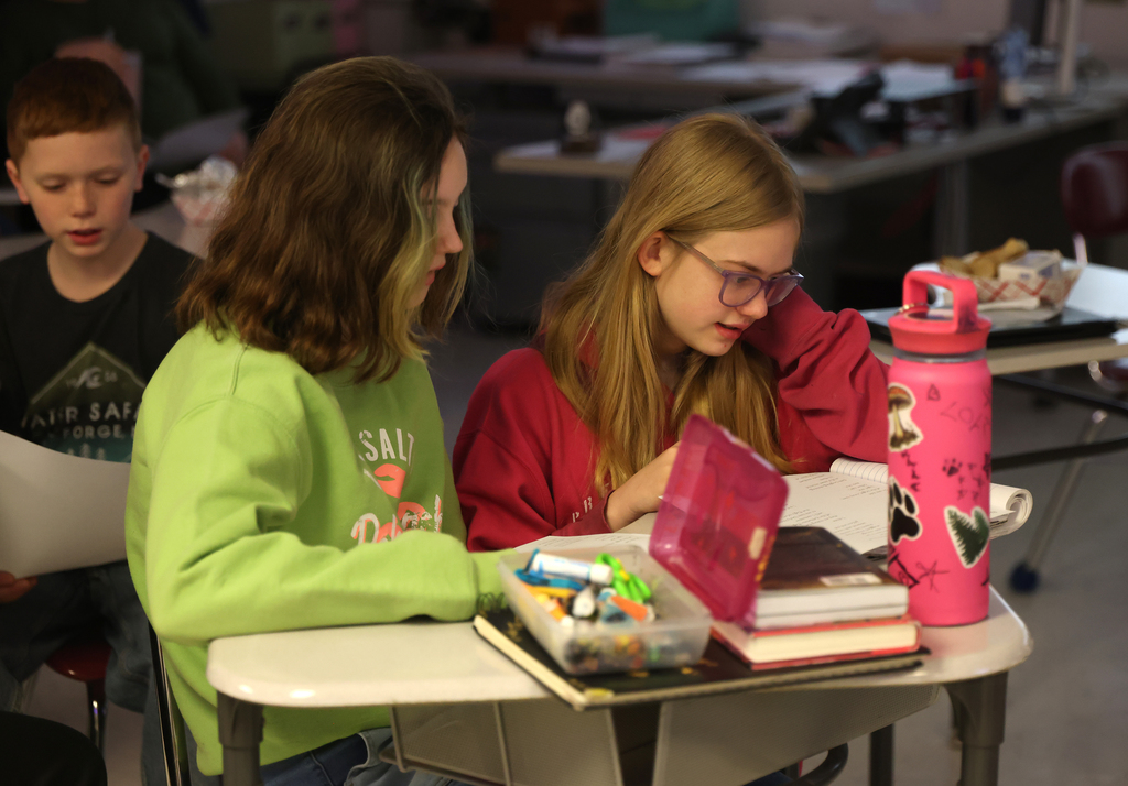 Students learning the Read Like Us strategy on Friday