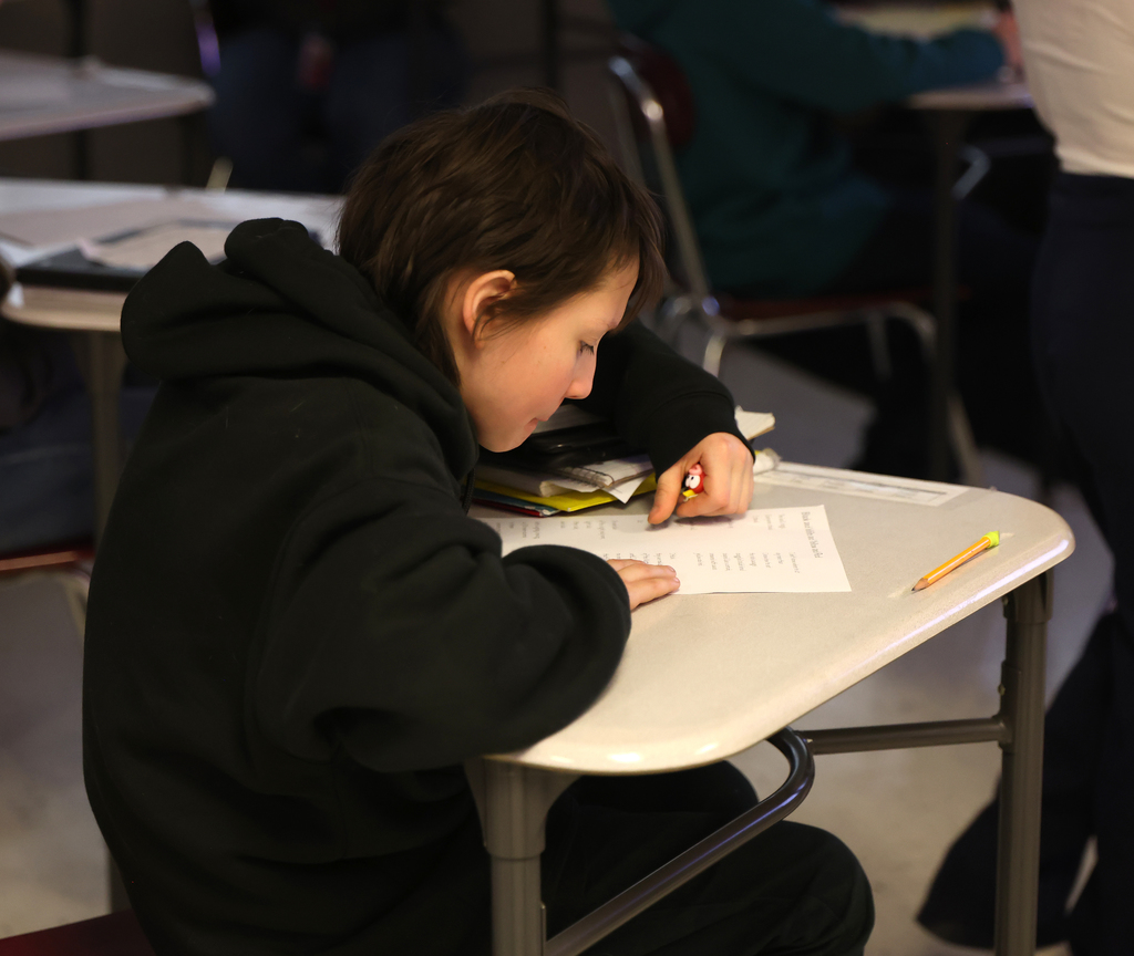 Students learning the Read Like Us strategy on Friday