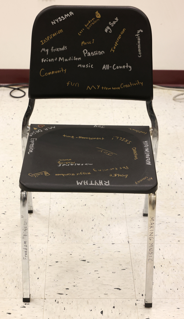 The chair with the words printed on it