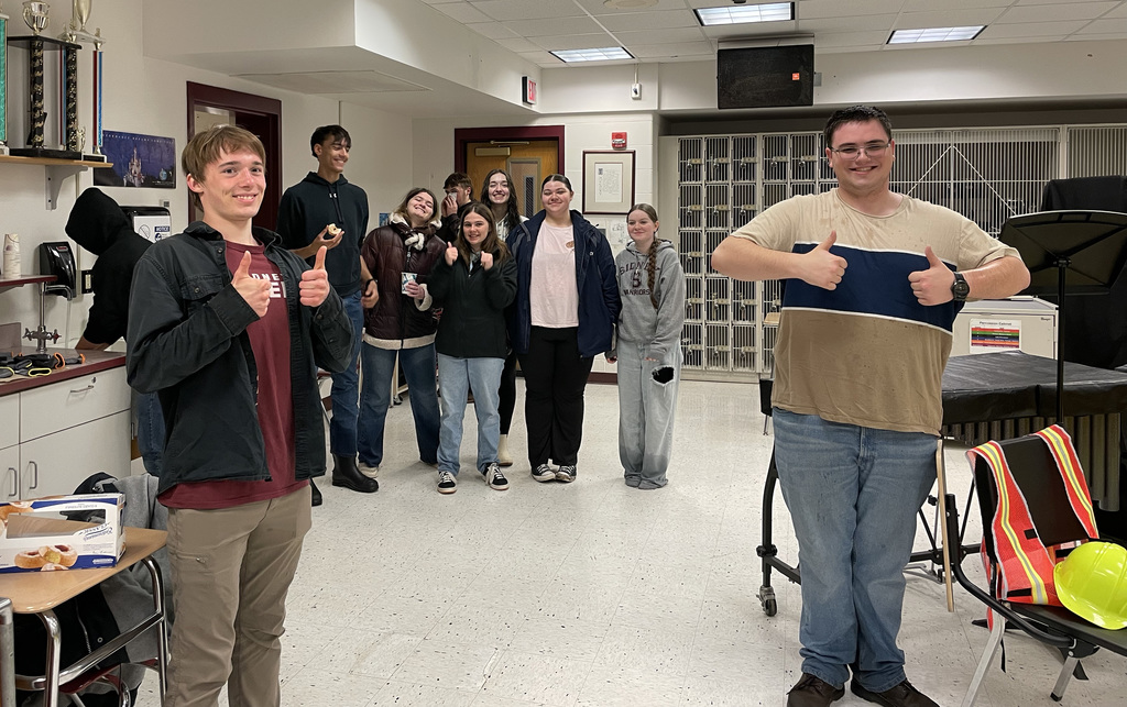 Tri-M members after working on the Route 8 section