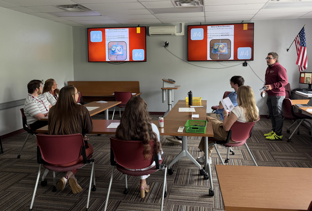 New teachers planning during new teacher orientation. 
