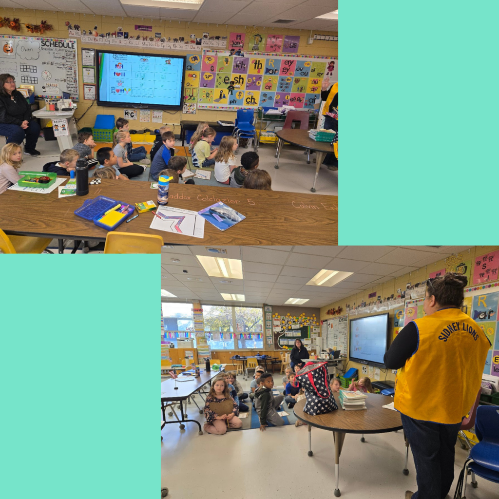 Lions club members handing out flags and talking to our first graders