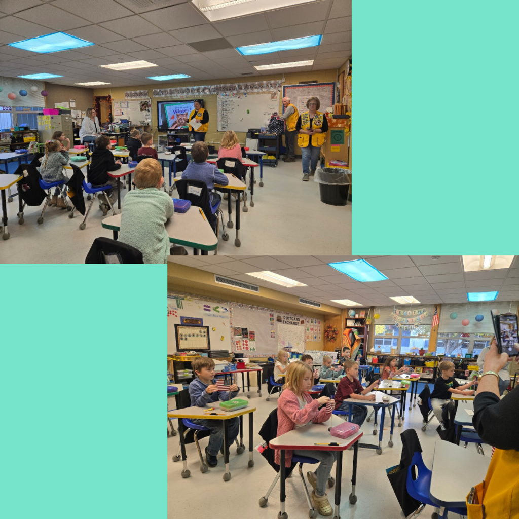 Lions club members handing out flags and talking to our first graders