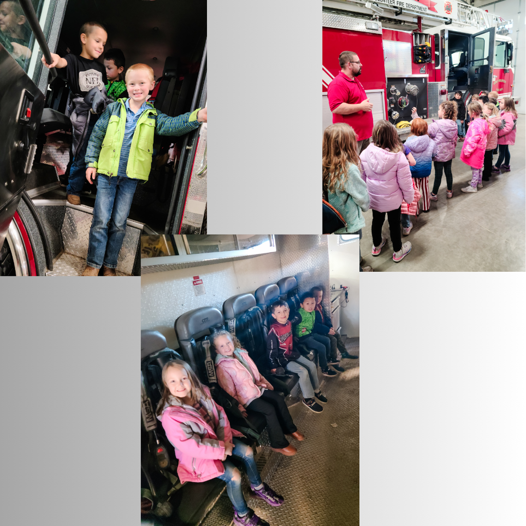 students looking at fire truck and looking inside