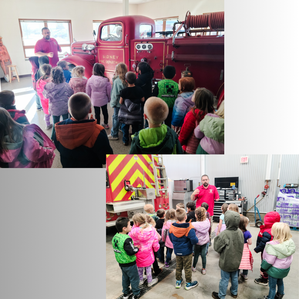 students listening to Kale at the fire station