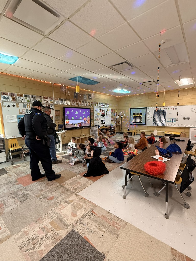 Police talked to students about Red Ribbon Week and handed out candy at West Side