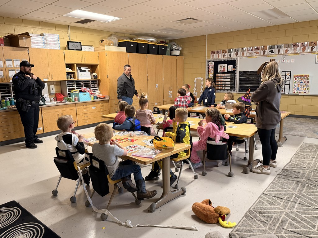 Police talked to students about Red Ribbon Week and handed out candy at West Side