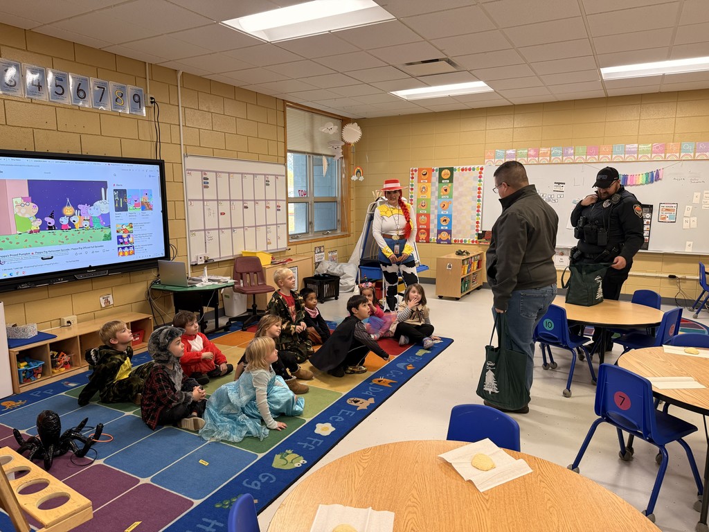 Police talked to students about Red Ribbon Week and handed out candy at West Side