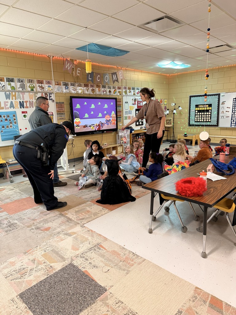 Police talked to students about Red Ribbon Week and handed out candy at West Side