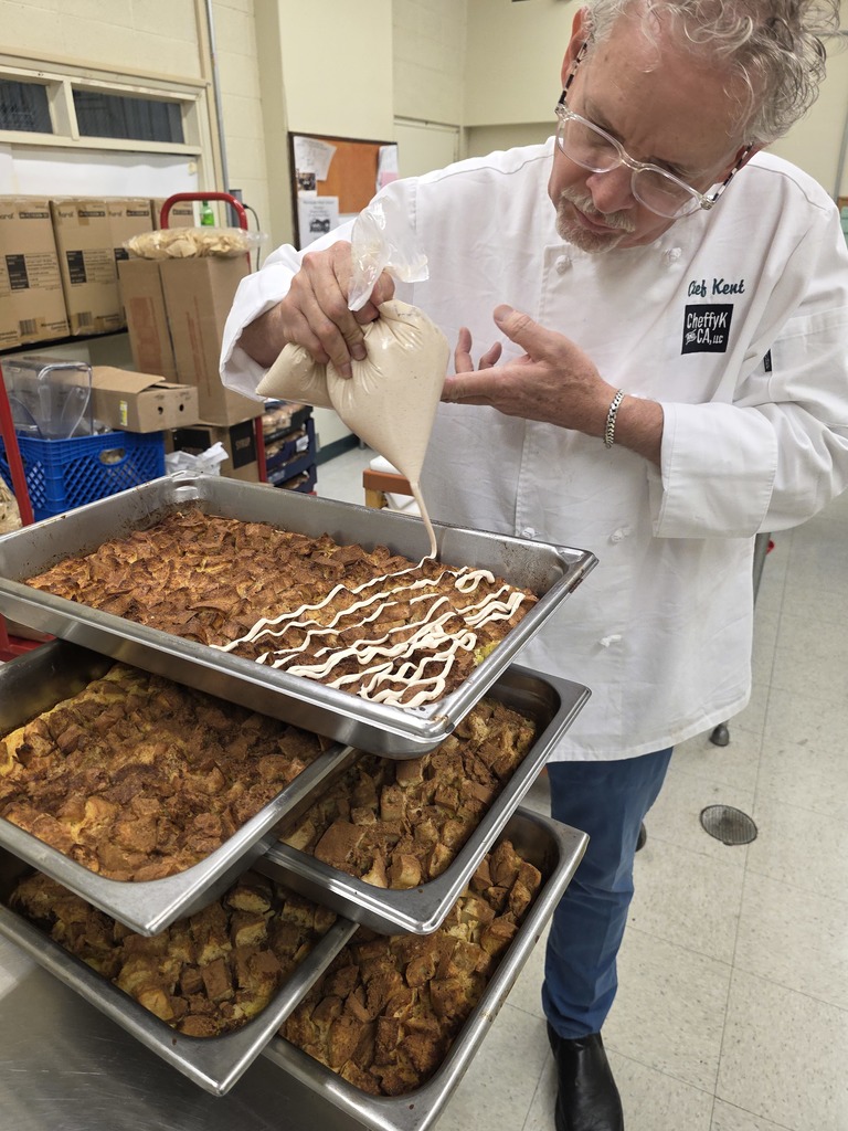 Chef decorating bread pudding