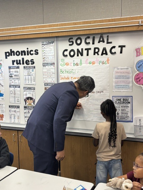 Congressman Vince Fong signing the social contract.