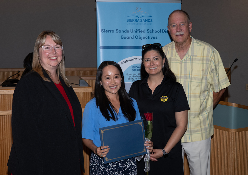 Cindy Chong with Principal Amador, Superintendent Moore, and President Campbell