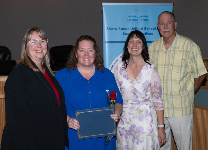 Rachel Kimbler with Principal MacKenzie, Superintendent Moore, and President Campbell