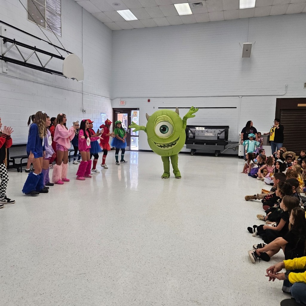 Masked Dancer at Huachuca Mountain! 

Teachers and staff put on a show for the students after our annual character parade! Ms. Stewart hosted the event while students got to guess which teacher was behind the costume - it was hilarious and so amazing to listen to the kids sing all the songs! 
Our cheer team danced in the background as well!
Go Bolts!