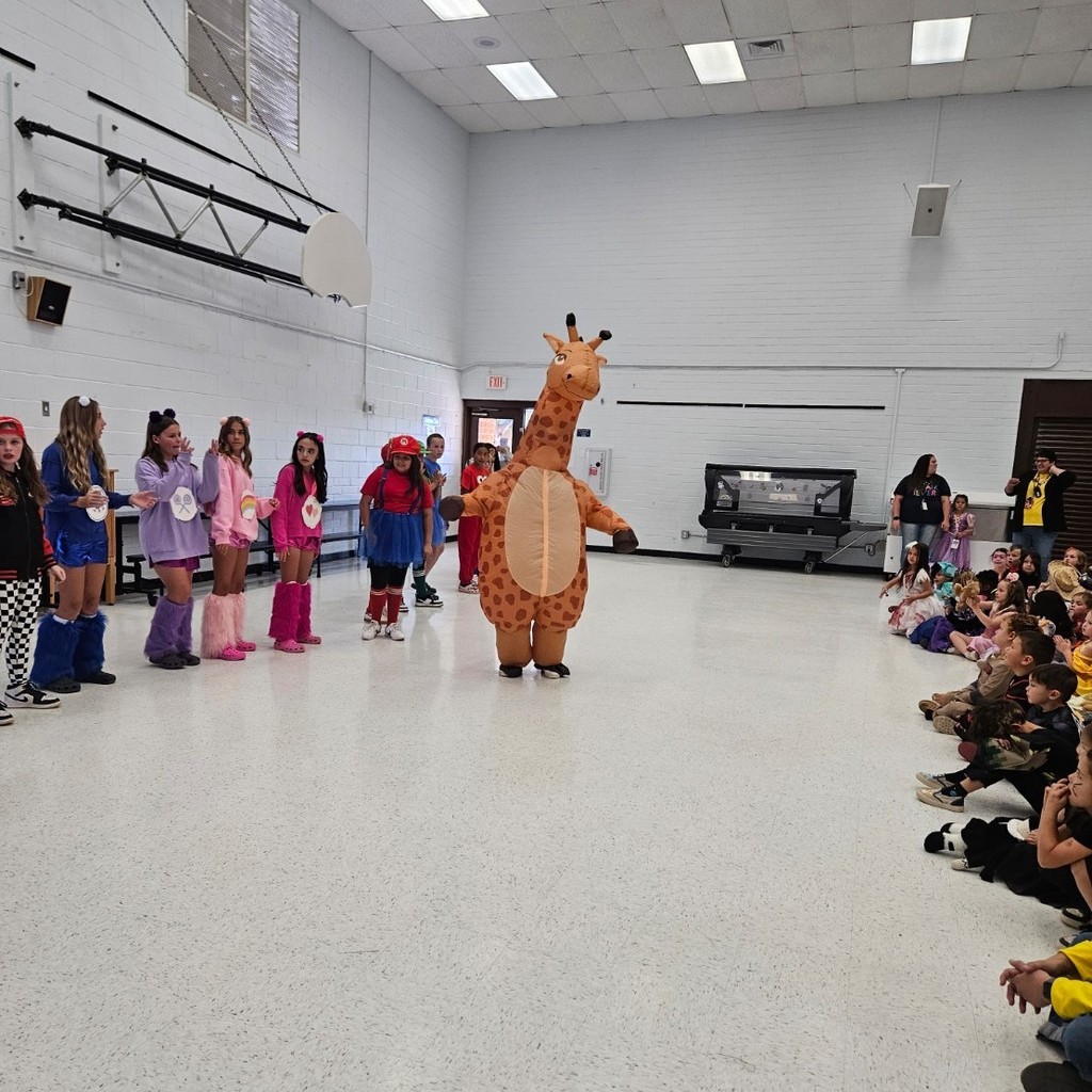 Masked Dancer at Huachuca Mountain! 

Teachers and staff put on a show for the students after our annual character parade! Ms. Stewart hosted the event while students got to guess which teacher was behind the costume - it was hilarious and so amazing to listen to the kids sing all the songs! Our 6th grade cheer team danced in the background as well to hype everyone up!

Go Bolts!