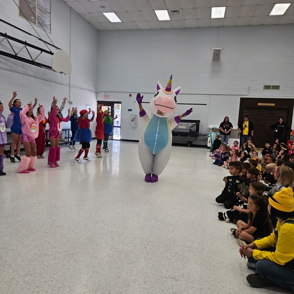 Masked Dancer at Huachuca Mountain! 

Teachers and staff put on a show for the students after our annual character parade! Ms. Stewart hosted the event while students got to guess which teacher was behind the costume - it was hilarious and so amazing to listen to the kids sing all the songs! Our 6th grade cheer team danced in the background as well to hype everyone up!

Go Bolts!