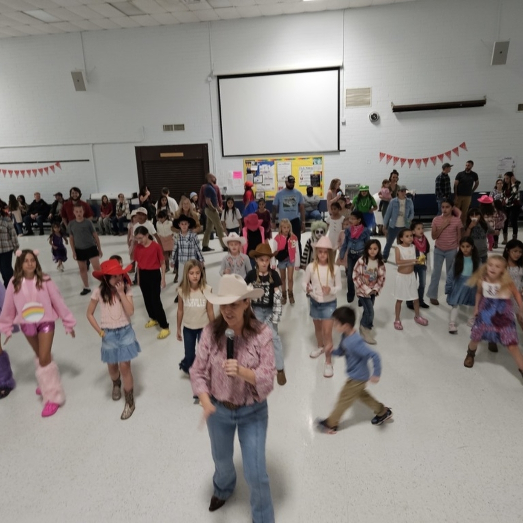 Our NEHS (National Elementary Honor Society) and StuCo (Student Council) clubs came together for a western dance! Mrs. Vinch and Coach Mac love a good time and so do our families! Thank you to our PTO for sponsoring the event for our clubs! We cannot wait until the next dance in the spring! 

Go Bolts!