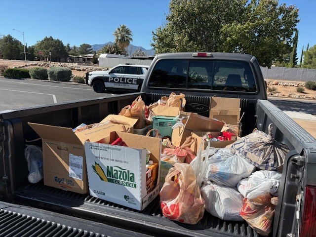 Village Meadows students collected food for the Edward Jones Food Drive.