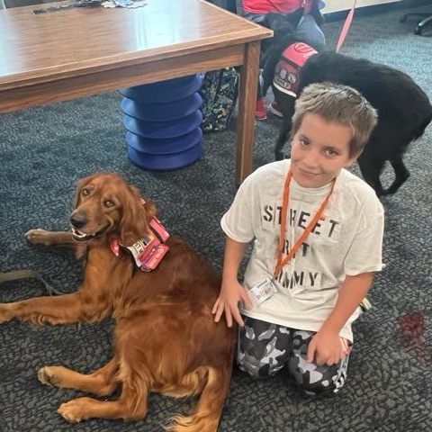 Village Meadows students got a visit from the therapy dogs!