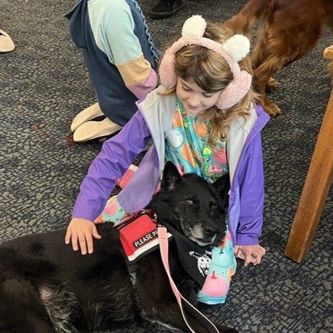 Village Meadows students got a visit from the therapy dogs!