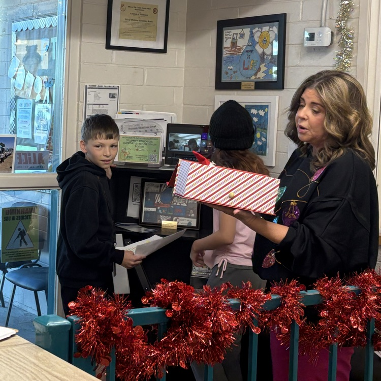 Special visitor Mayor McCaa has a delivery for the students