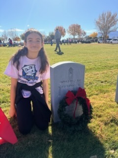 Students placing wreaths on the graves of our fallen soldiers. 
