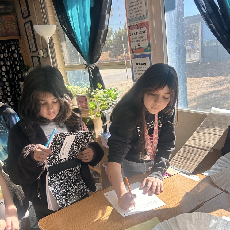 5th grade students testing different variables to create less friction.