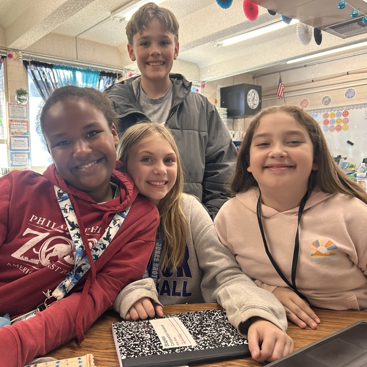 5th grade students testing different variables to create less friction.