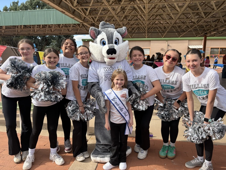 Village Meadows cheerleaders show up and cheer up the District Enrollment Fair  