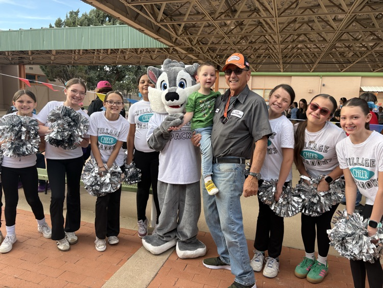 Village Meadows cheerleaders show up and cheer up the District Enrollment Fair. 