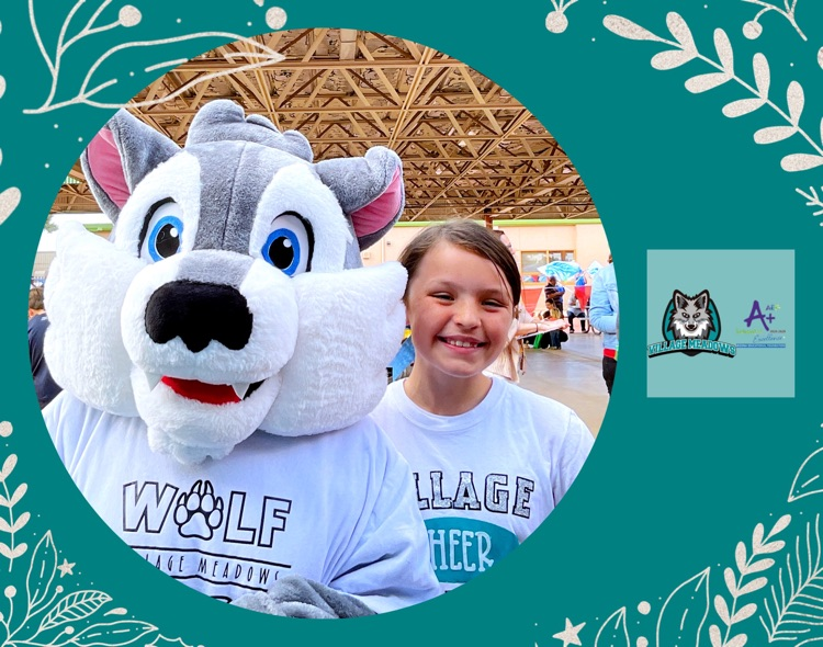 Village Meadows cheerleaders show up and cheer up the District Enrollment Fair. 