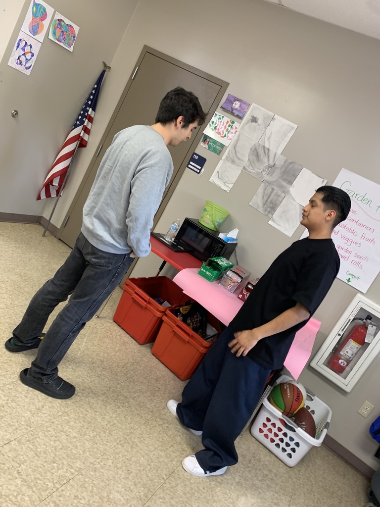 high school students and staff celebrate Hispanic Heritage Month