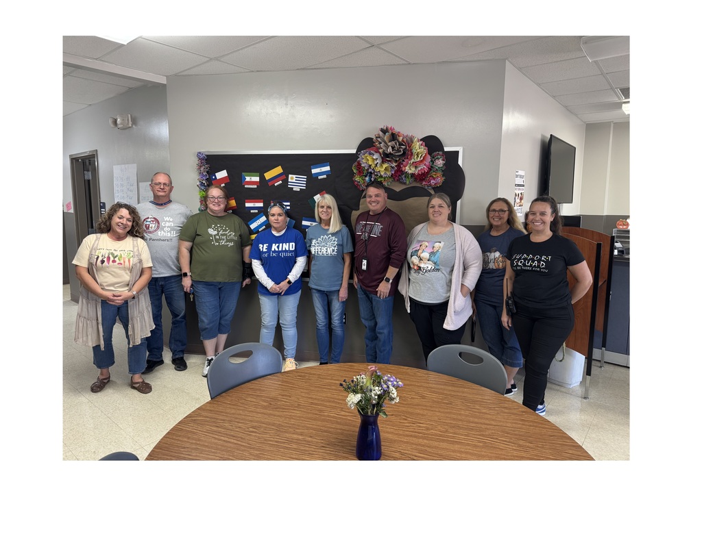 high school teachers with motivational t-shirts