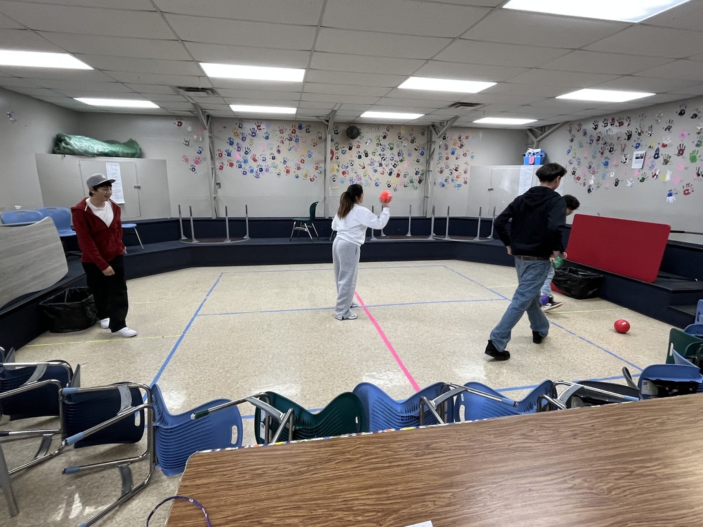 high school students playing a game in PE