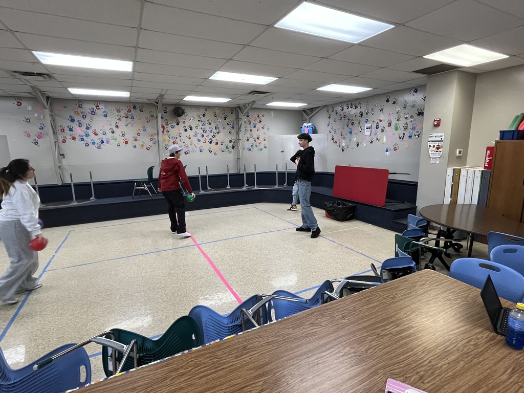 high school students playing a game in PE
