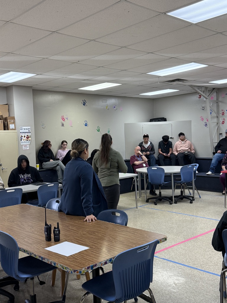teachers presenting to high school students