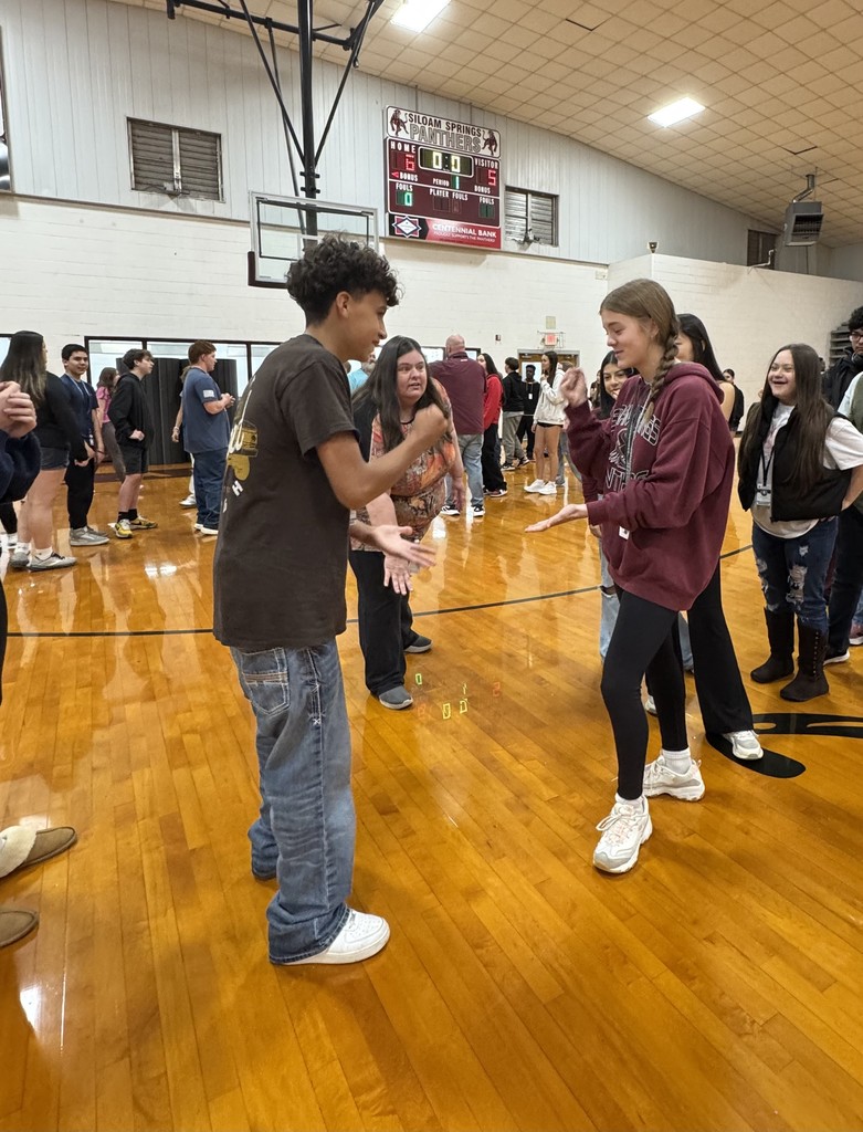 students playing rock, paper, scissors