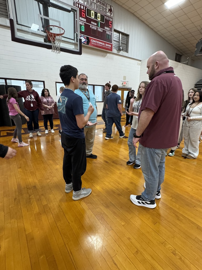 students playing rock, paper, scissors