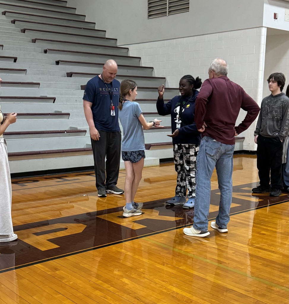 students playing rock, paper, scissors