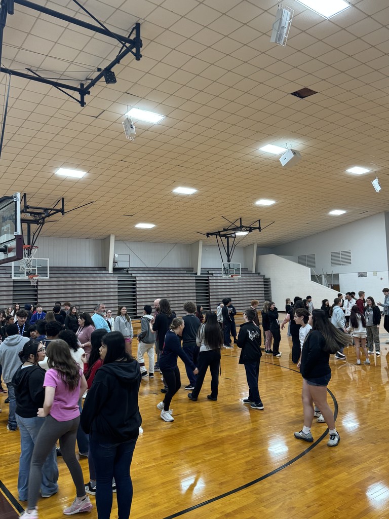 students playing rock, paper, scissors