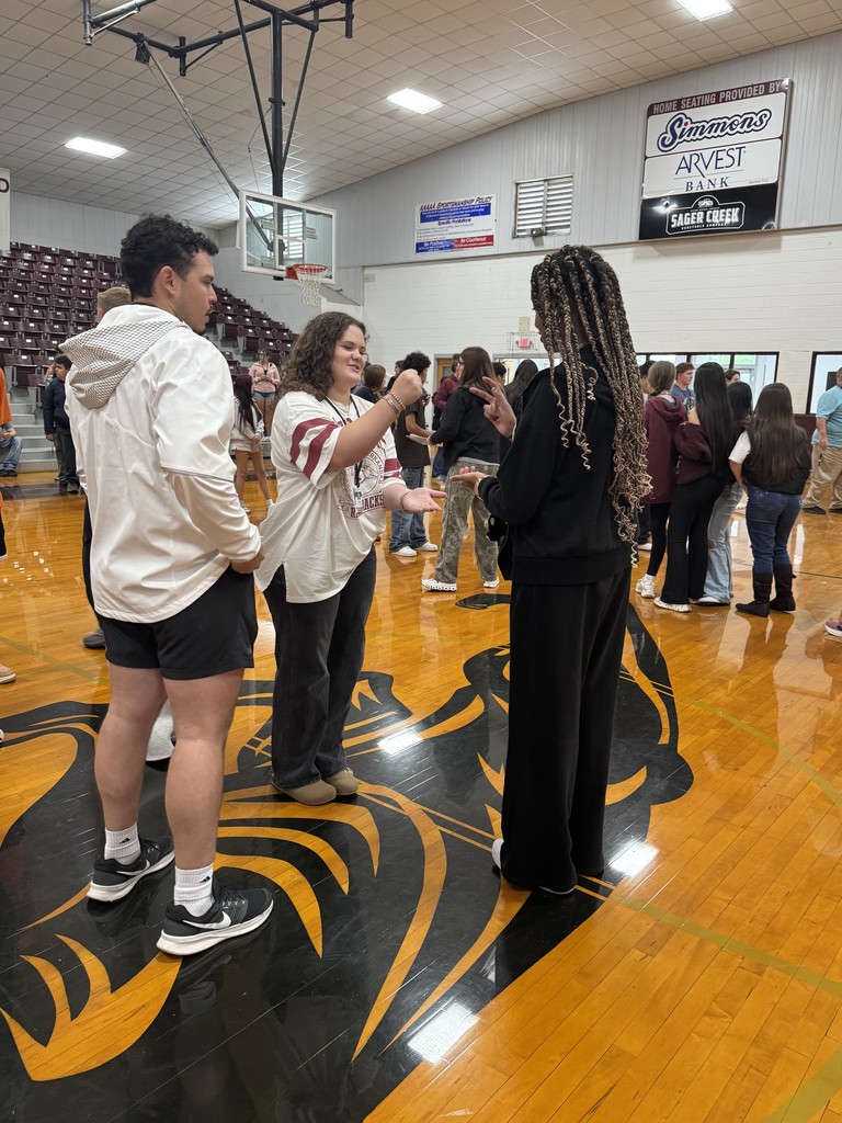 students playing rock, paper, scissors