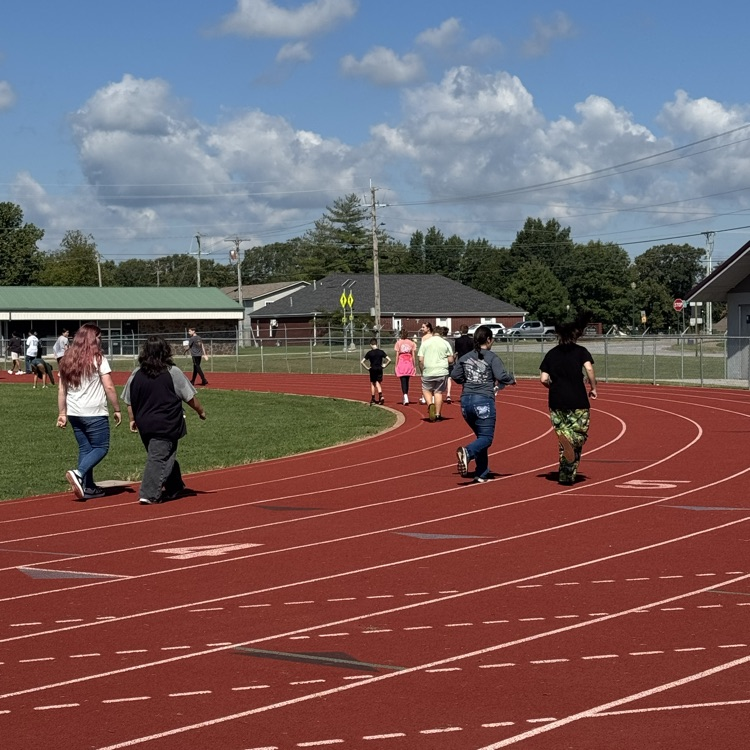 students walking the track