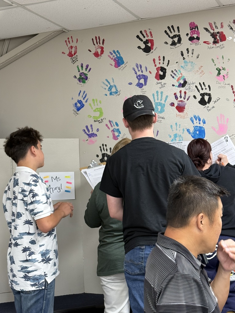 high school students and staff member