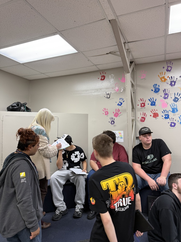 high school students and staff member