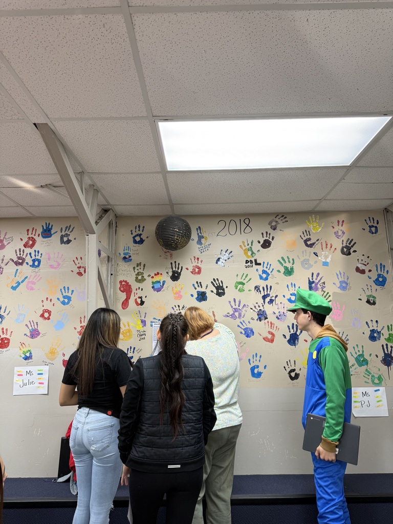 high school students and staff member