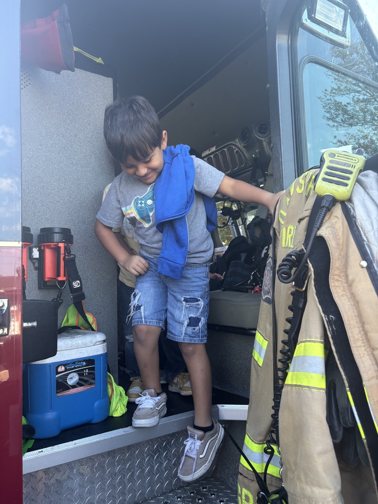 students on fire truck
